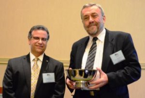 Dr. Auturo Schultz, Chairman of TMS's Research Committee, presents the 2013 Scalzi Research Award to Dr. Jäger at TMS's October 2013 Awards Luncheon in Herndon, Virgnia.